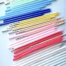 Свечи белые высокие с серебристым глиттером Свечи белые высокие с серебристым глиттером